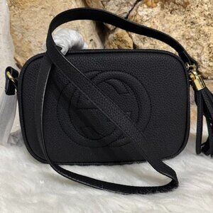 Textured Black Crossbody Camera Bag with Tassel Accent
